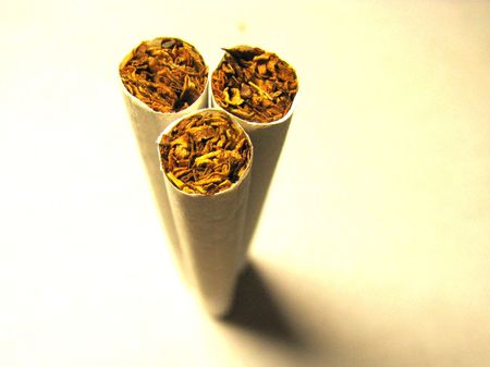 three cigarettes standingの写真素材