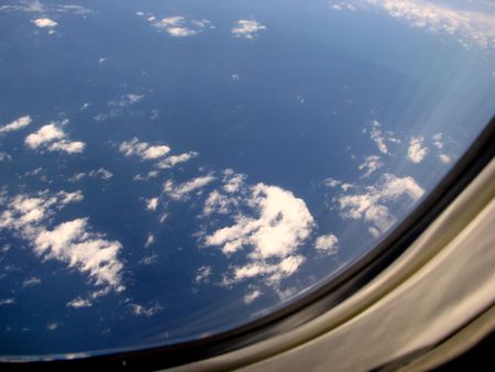 looking sky through an airplane windowの写真素材
