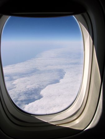 sky seen through the airplane windowの写真素材