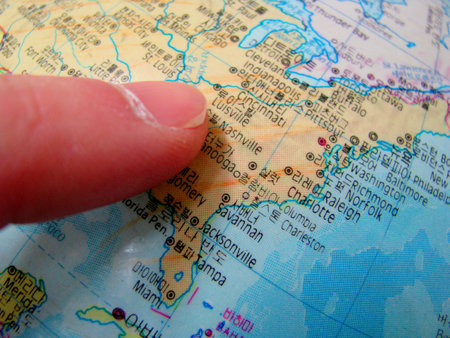 finger pointing on florida, USA on a plastic globe in the classroomの写真素材