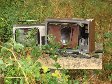 broken tv in the forest on the road to santiagoの写真素材