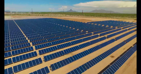 aerial view of solar panels on a sunny day. power farm producing clean energy
