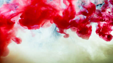 Motion Color drop in water,Ink swirling in ,Colorful ink abstractionの写真素材
