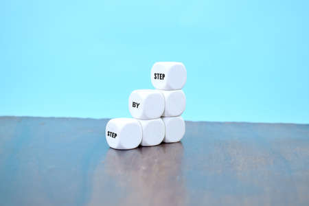 cubes with motivational message step by stepの写真素材