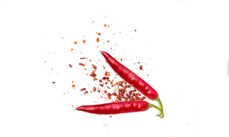Red pepper and seeds on table Top view