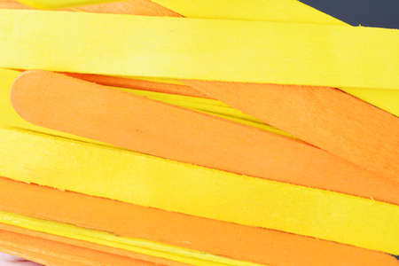 Closeup view of Colourful Ice cream sticks making backgroundの写真素材