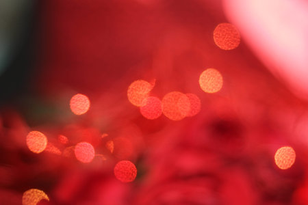 Red lights bokeh blurred background . defocused