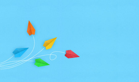 Color paper airplanes on white backgroundの写真素材