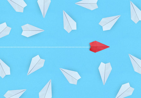Small business concept with small red paper plane on blue background 2