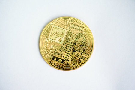 Close up golden coin with bitcoin symbol isolated on white backgroundの写真素材
