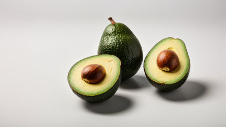 Avocado and hazelnut on a white background. Healthy food.の素材