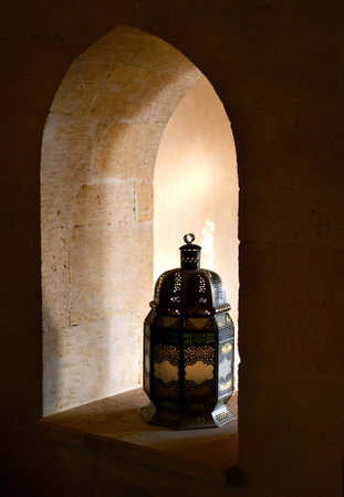 Lantern in the window of the mosque in Cairo, Egyptの写真素材