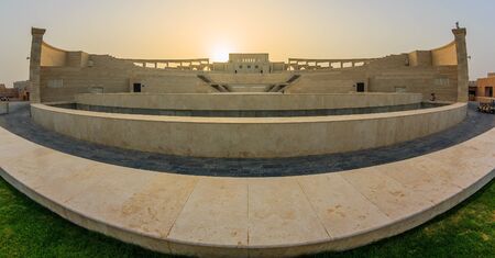 Doha,Qatar-May 9,2013: The amphitheater in Katara Cultural Village, Doha Qatar fish eye view in daylight with the sun in backgroundのeditorial素材