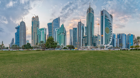 Doha,Qatar-November 10,2019: Doha skyline in West bay district daylight view with clouds in the sky
