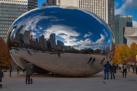 Chicago, Illinois-December 2,2015: Cloud Gate (The bean) at Millennium Park with Chicago skyline in the background Daylight view.のeditorial素材