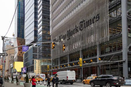 New York City, USA - December 17, 2019:The New York Times newspaper headquarters building in Eighth Avenue; 40th & 41st Street exterior daylight view with people and cars in the streetのeditorial素材