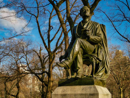 Fitz Greene Halleck Statue (by  James Wilson Alexander MacDonald)  in Central park New York city daylight view with trees and clouds in skyのeditorial素材