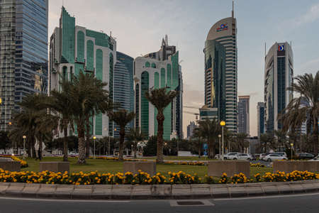 Doha corniche daylight view with skylines and clouds in sky in backgroundのeditorial素材