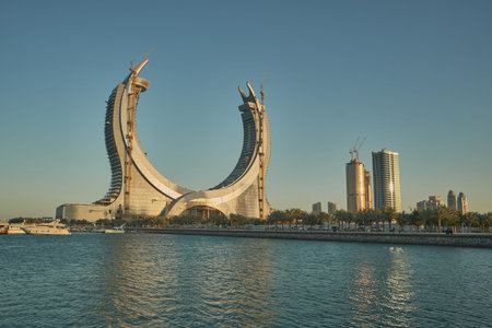 Lusail Corniche in Lusail city, Qatar  at the marina sunset shot showing people walking on the...