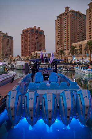 The pearl Marina in Porto Arabia , Doha, Qatar sunset view with Yachts in foreground, buildings and clouds in the sky in backgroundのeditorial素材