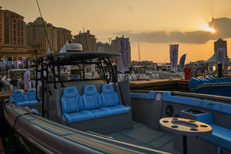 The pearl Marina in Porto Arabia , Doha Qatar daylight view with Yachts in foreground, buildings and...