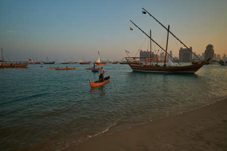 Traditional boats on the beach in Dubai, United Arab Emiratesの写真素材