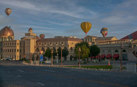 Hot air balloons in Katara Cultural village in Doha, Qatar daylight view with clouds in the sky in backgroundのeditorial素材
