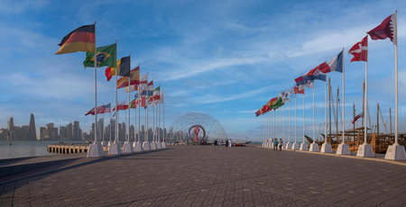 The FIFA World Cup Qatar 2022 Official Countdown Clock was unveiled on Sunday 21 November at Doha picturesque Corniche Fishing Spot with flags of participant countriesのeditorial素材
