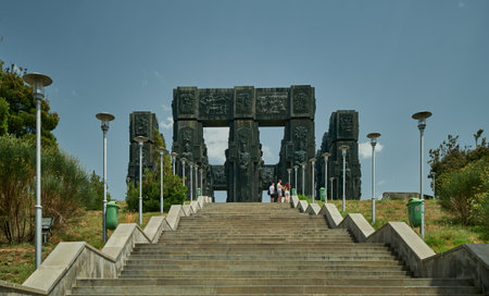Chronicle of Georgia located on a small hill on the outskirts of Tbilisi, Georgia also known as  History Memorial of Georgia, daylight view with clouds in skyのeditorial素材