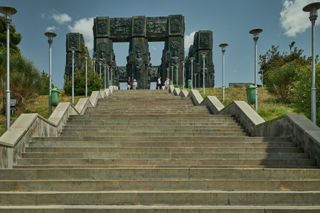Chronicle of Georgia located on a small hill on the outskirts of Tbilisi, Georgia also known as  History Memorial of Georgia, daylight view with clouds in skyのeditorial素材