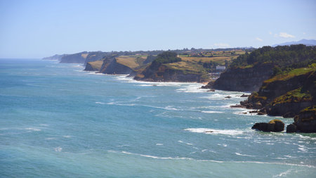 Wide coastal view with cliffs and ocean horizonの写真素材
