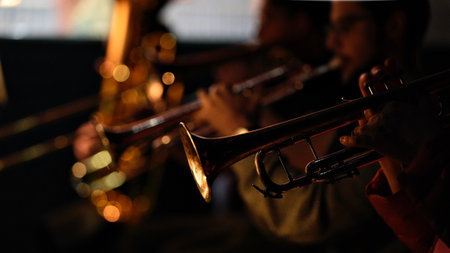Musicians playing trumpets in jazz bandの写真素材