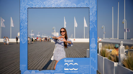 Tourist posing in city photo frame on Sopot pier, 10 September 2023のeditorial素材