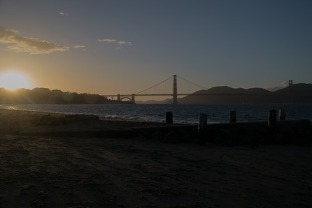 sunset from the beach with Golden Gate in San Francisco backgroundのeditorial素材