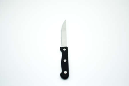 knife with black handle in a white backgroundのeditorial素材