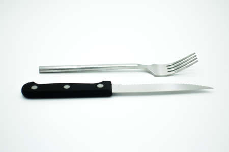 stainless fork and knife on white backgroundのeditorial素材