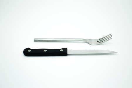 stainless fork and knife on white backgroundのeditorial素材