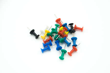 colored pushpins on a white backgroundのeditorial素材