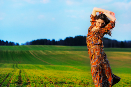 portrait of a beautiful girl in a fieldの写真素材