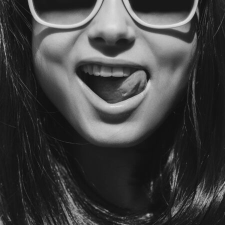 Sensual portrait of a woman with glassesの写真素材