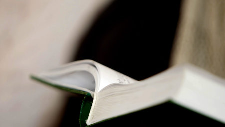 open book selective focus close up view, holy book reading background.