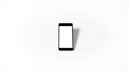 Mobile phone with empty white blank screen mockup isolated on white background. With shadow and copy...