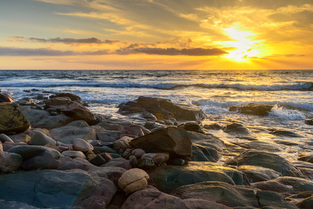 Dramatic sunset on the rocky beach South Australiaの写真素材