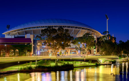 Adelaide South Australia  January 18 2015: View of Adelaide Oval and River Torrens Foot Bridge at night. This place is one of the most popular tourist attractions in the city of Adelaide. Long exposure effectのeditorial素材