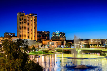 Adelaide, South Australia - January 18, 2015: Intercontinental Hotel and Riverbank Bridge across Torrens River at nightのeditorial素材