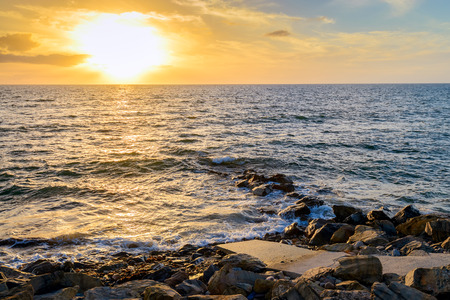 Sunset above the sea at Marino Rocks beachの写真素材