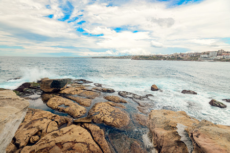 North Bondi Rocks with dramatic sky, Australiaの写真素材