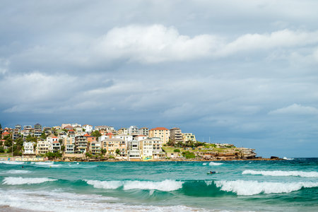 Sydney, Australia - November 8, 2015: Surfer in the waters of Bondi Beach. Bondi beach is one of the most famous places for surfing in Australiaのeditorial素材