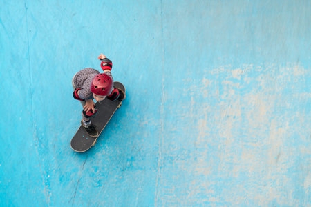 Sydney, Australia - November 8, 2015: Unknown skateboarder is doing skating tricks at Bondi Skate Park. Bondi Beach Skate Park is a new well constructed skate park with one of the best vert bowls in he country and amazing views over Bondi Beach.のeditorial素材