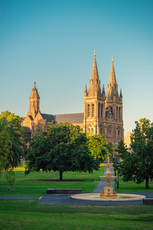 St. Peter's Cathedral of Adelaide at sunset, South Australia. View from Pennington Gardensの写真素材